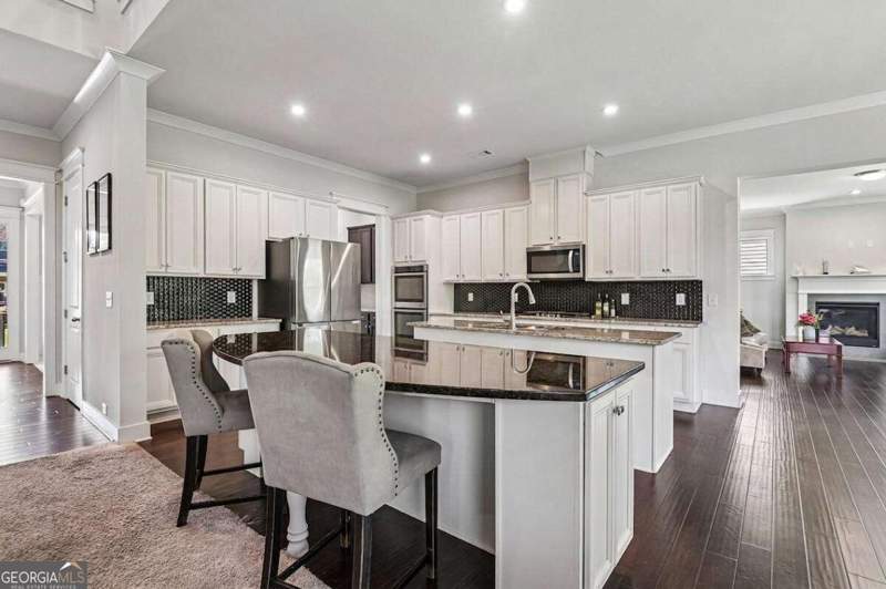 6 bedroom Single Family Residence at 606 Taymack, Estates at Fernwood Creek, Woodstock — photo 2