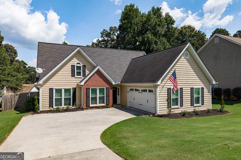 4 bedroom Single Family Residence at 5685 Sugar Crossing Drive, Sugar Crossing, Sugar Hill — photo 2
