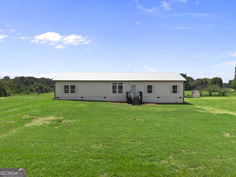 4 bedroom Manufactured Home,Single Family Residence at 1300 Credille Pond Road, None, Greensboro — photo 1