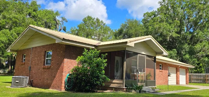 Solid Brick Home on an Acre Lot in SE Peacock Terrace, Lake City, sold by Frances Smith